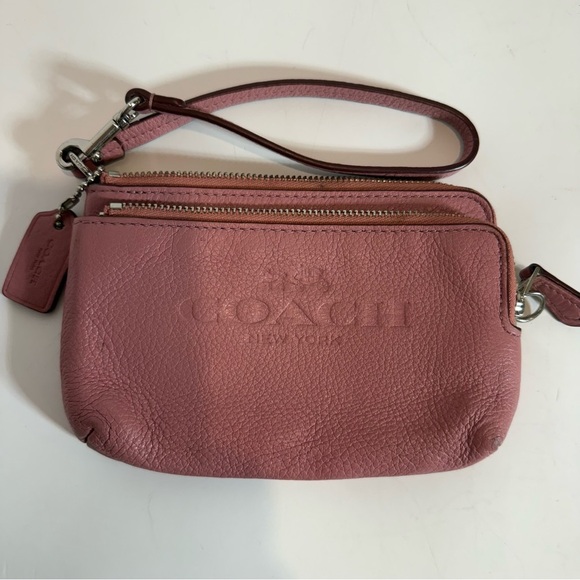 Coach Handbags - Coach wristlet wallet pink